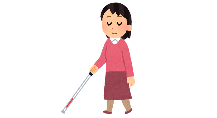白杖を使って歩く人