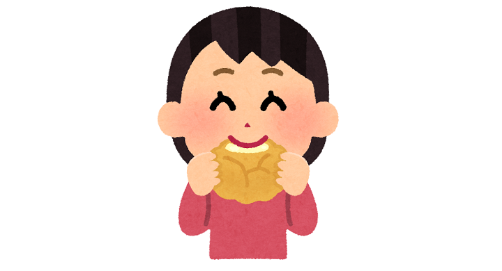 シュークリームを食べる子供